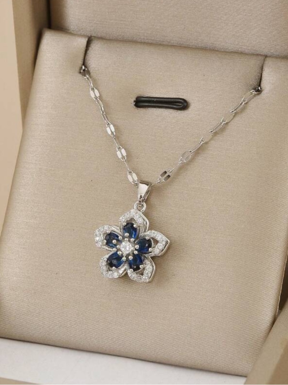 Spinning Silver Floral Sapphire Pendant Necklace - Blue and Silver